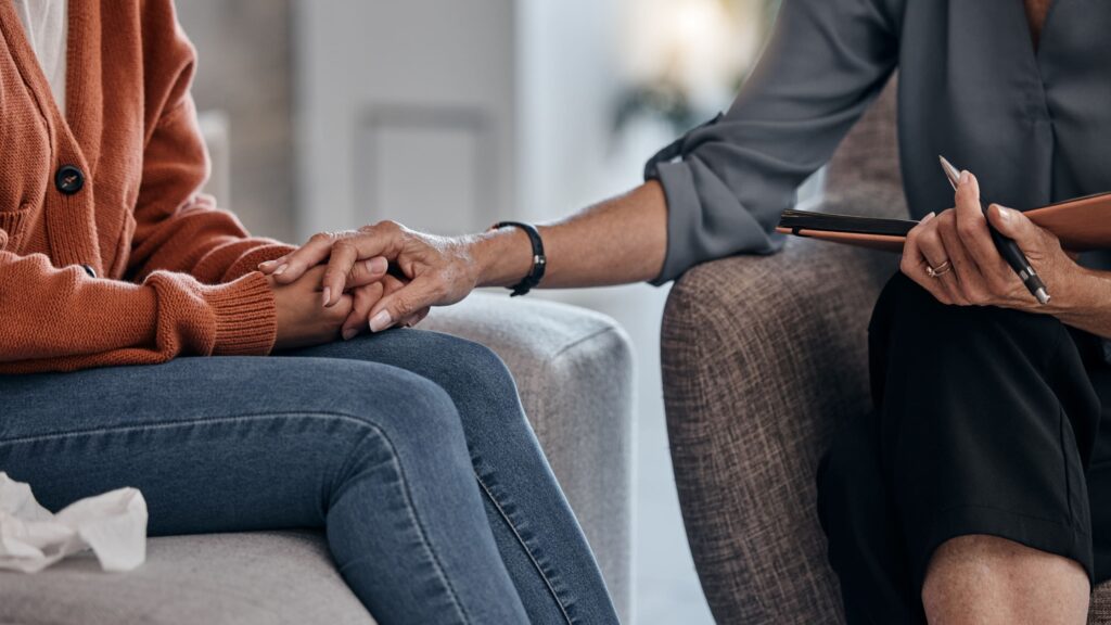 A psychiatrist offers support to a client during CPTSD treatment in Nashville.